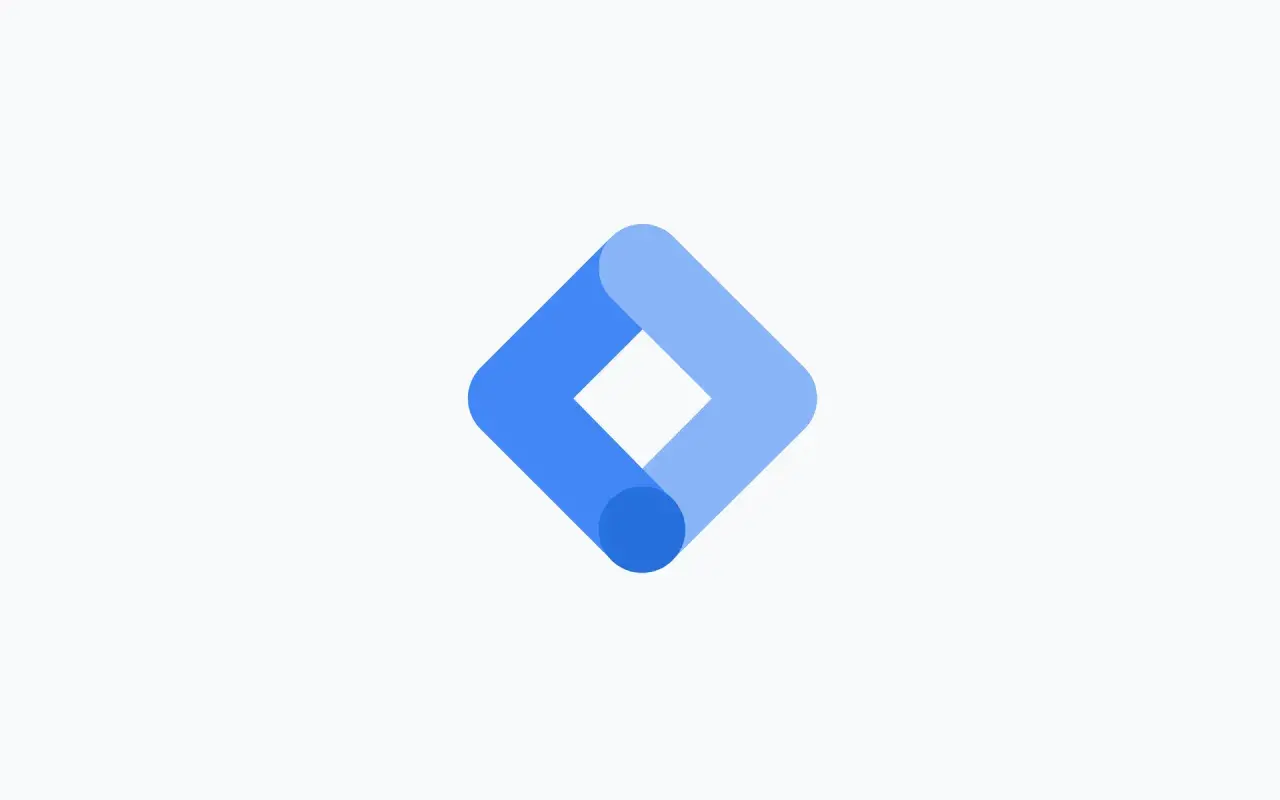 Logo Google Tag Manager. Dwa niebieskie, nachodzące na siebie romby tworzą symbol narzędzia do zarządzania tagami.